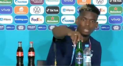 Pogba sigue los pasos de Cristiano... Quita una botella de cerveza en la conferencia