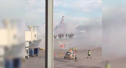 Pasajeros evacúan avión de American Airlines tras incendio en el motor en aeropuerto en Denver