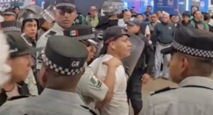 Aficionados de la Selección Mexicana pelean en el Estadio Cuauhtémoc tras el triunfo ante Ghana; son contenidos por Guardia Nacional y policías