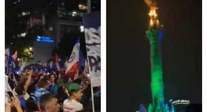 Aficionados de Cruz Azul tiñen de celeste el Ángel de la Independencia para festejar el título de su equipo