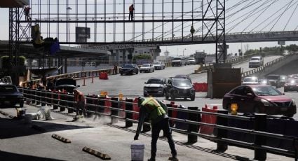 Se desploma estructura metálica en salida vehicular del AICM; un automovilista resulta afectado