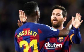 Lionel Messi festeja con Ansu Fati